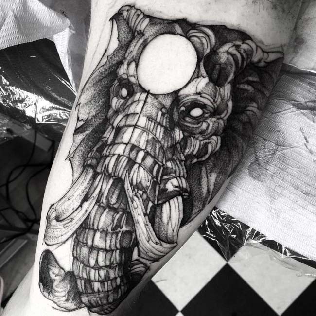 strong elephant tattoo