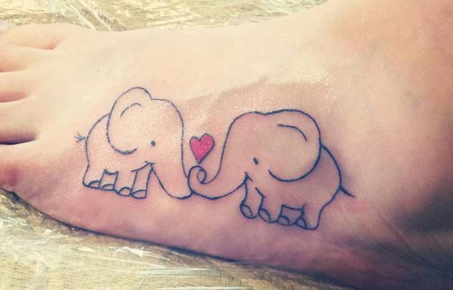 elephant tattoo on foot lover