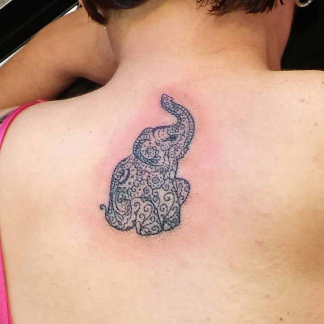 back elephant tattoo