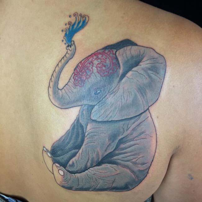 water gushing elephant tattoo