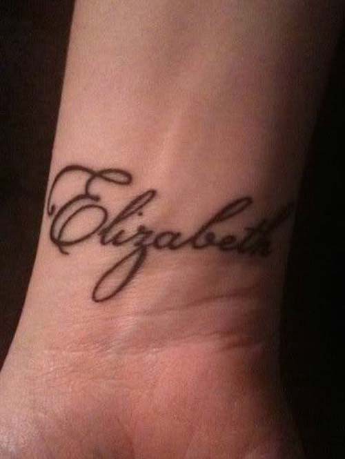 simple name tattoo on wrist