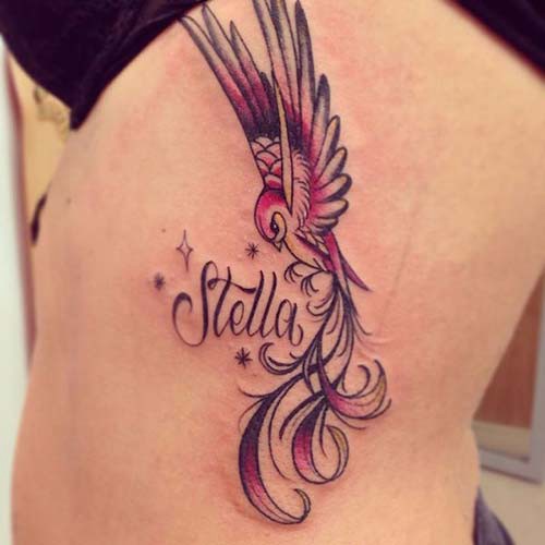 woman belly name tattoo
