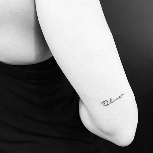 elbow name tattoo