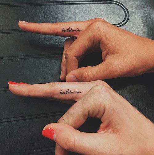 couple finger name tattoo