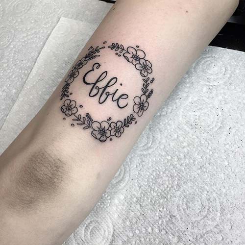 name tattoo with flowers name tattoo with flowers