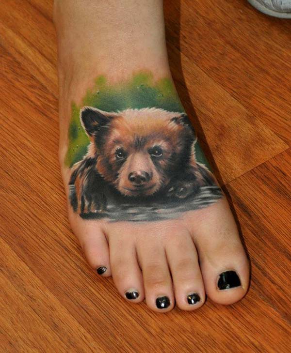 bear tattoo on foot