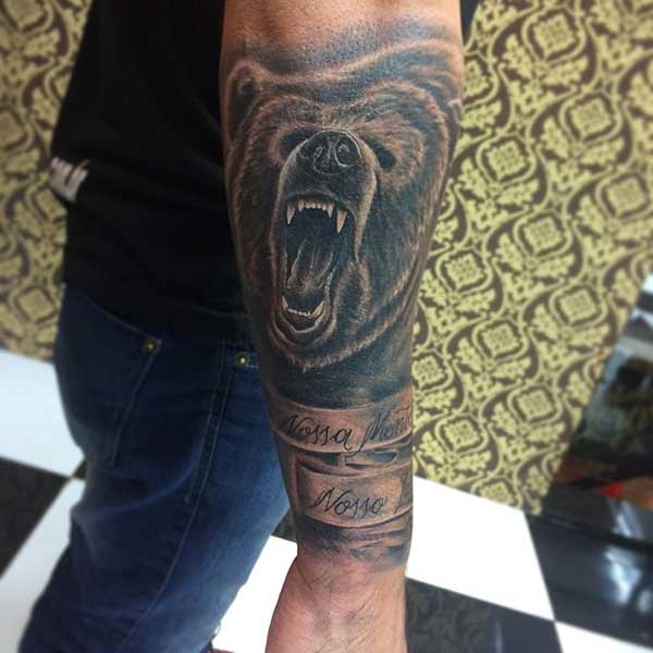 bear tattoo man arm