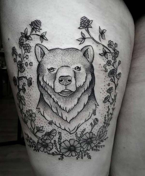 bear and flowers leg tattoo