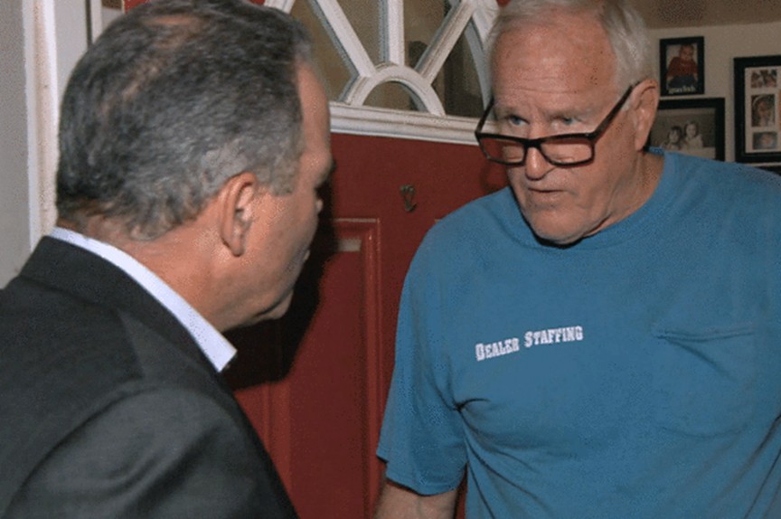 John Vansice answering questions from a reporter at his residence in Arizona. Photo courtesy of CBS News.
