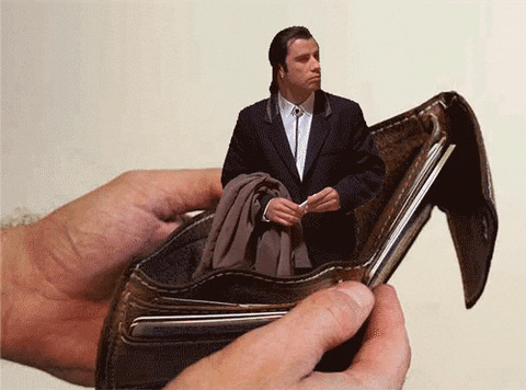 Gif of John Travolta meme where he stands in a wallet perplexed at lack of money in it