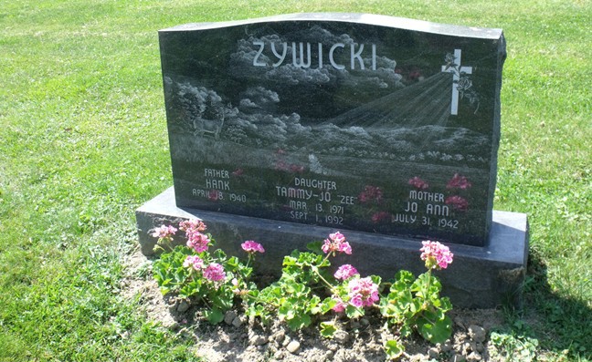 Tammy Jo Zywicki is buried at the West Newton Cemetery in West Newton, Pennsylvania.
