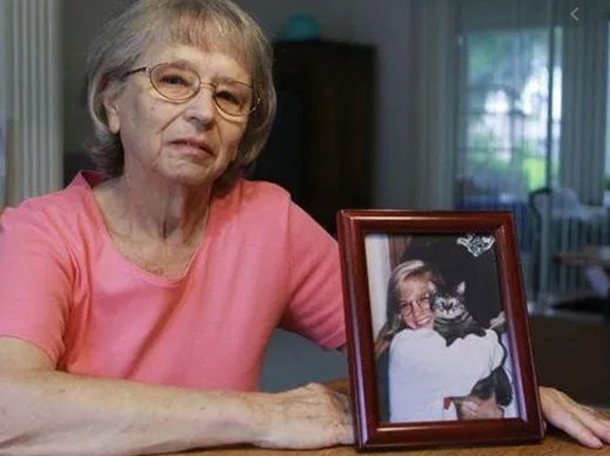 JoAnn Zywicki with a photograph of her daughter Tammy Jo Zywicki who was murdered in 1992.