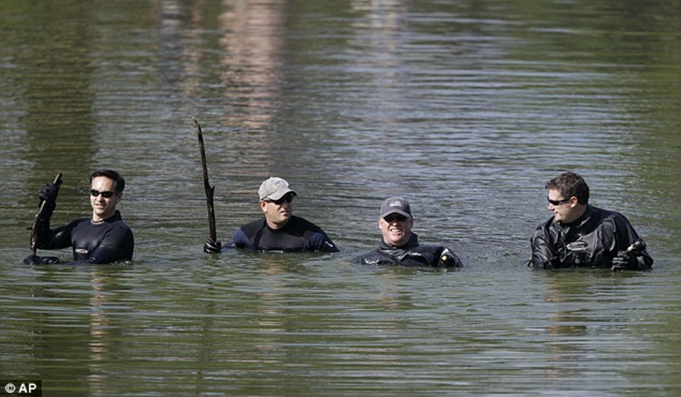 FBI dive teams search Meyers Lake for any sign of Lyric Cook and Elizabeth Collins.