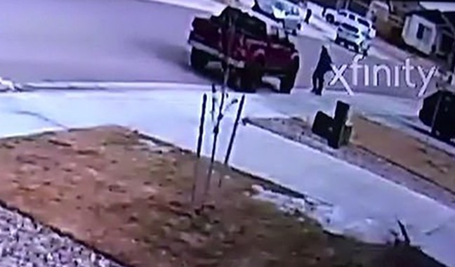 Video surveillance surfaces showing a child getting into a red truck around 10:15 a.m. on January 27, 2020.
