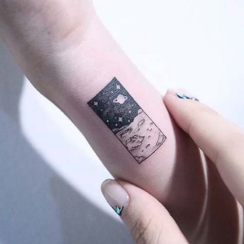space and moon tattoo