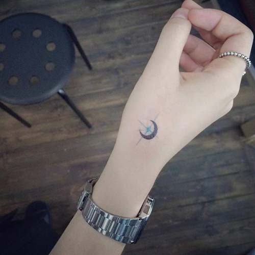 tiny moon tattoo