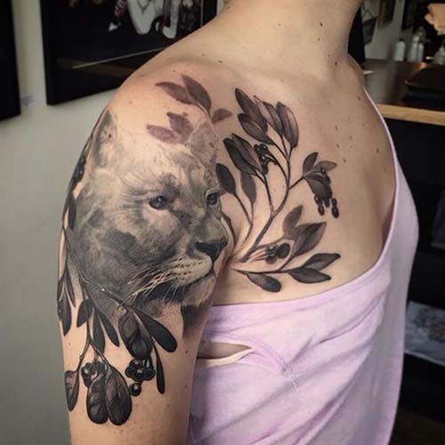 wild cat woman shoulder tattoos