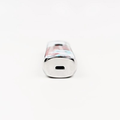 A close-up of the USB port on the bottom of a Smok Nord.
