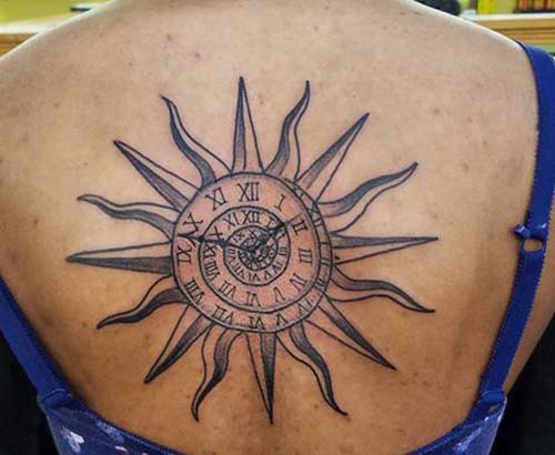woman back sun tattoo woman back sun tattoo