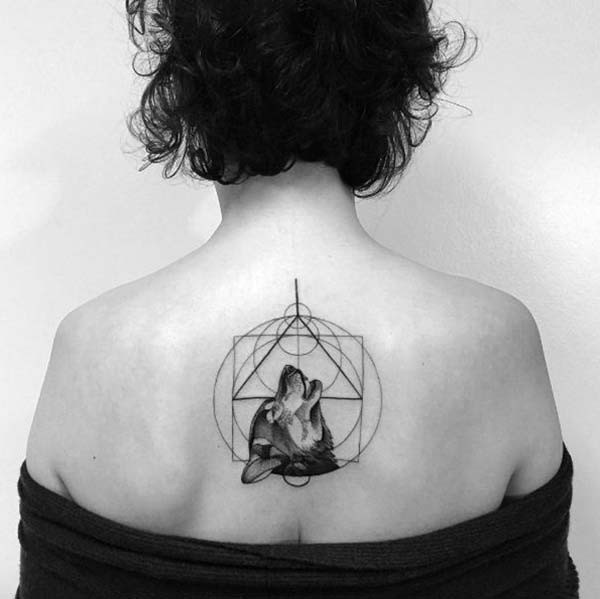 geometric back tattoo wolf figure