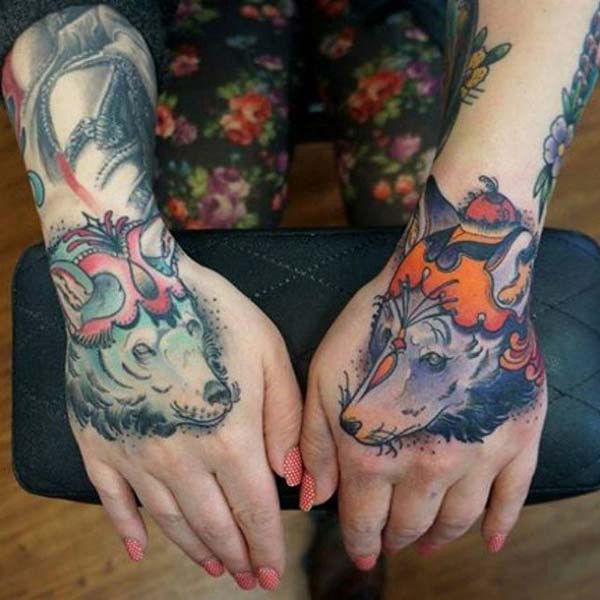 wolf tattoo on hand