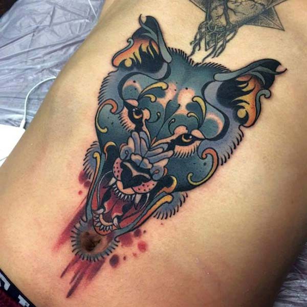 frustrated wolf tattoo