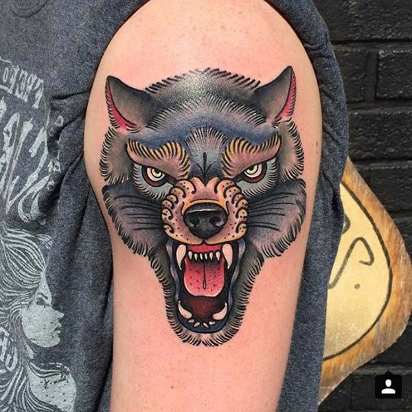 arm tattoo wolf
