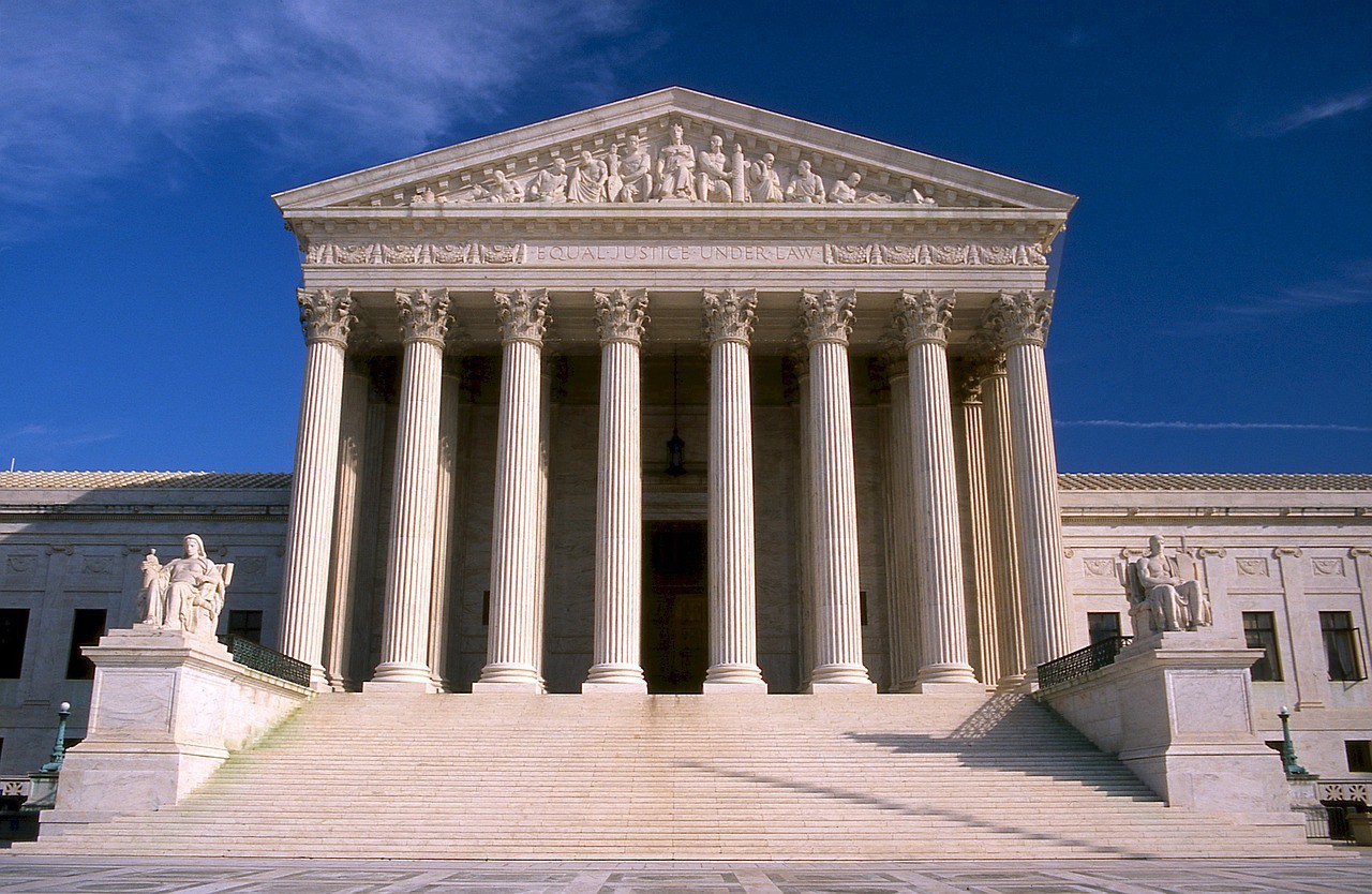 Front of Supreme Court building with stairs leading up to columns.