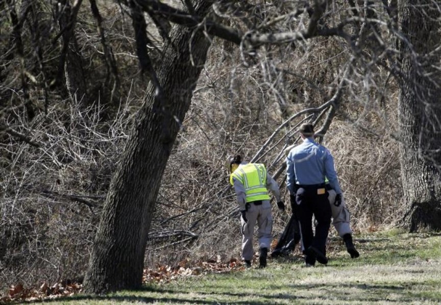 Washington Metro Police searching Kenilworth Park in D.C. on March 31, 2014.