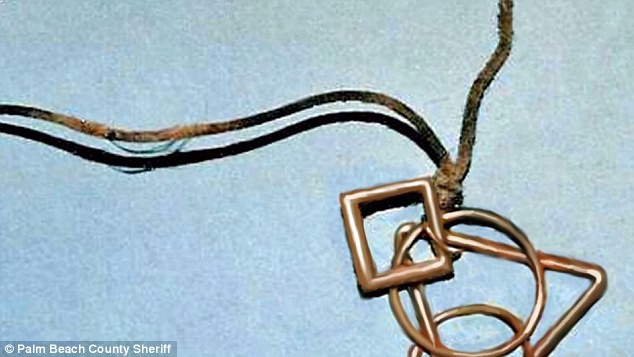 Jane Doe was found wearing a cord necklace with three geometric symbols.