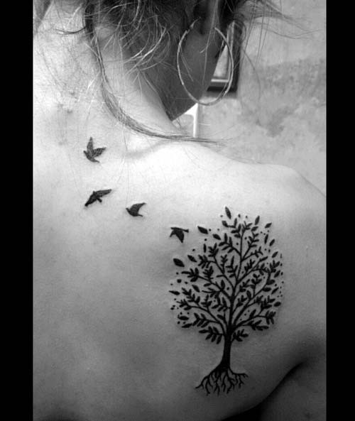 tree and flying birds tattoo