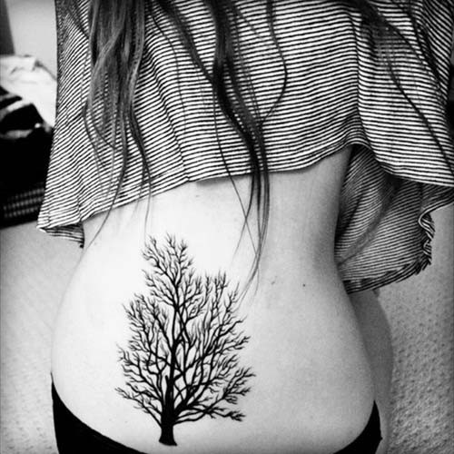 woman belly tree tattoos