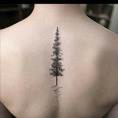 woman back tree tattoo