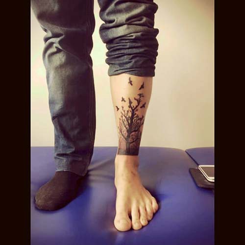 lower leg tree tattoo