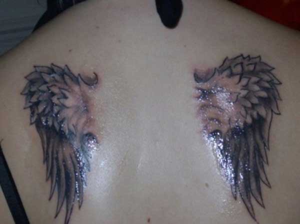 back wing tattoo