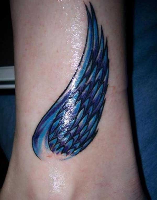 blue wing tattoo