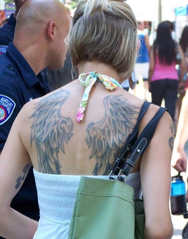 wing tattoo girl