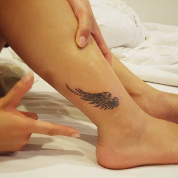 ankle small wings tattoo