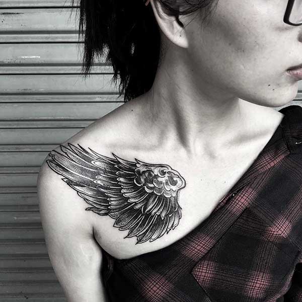 collarbone wing tattoo