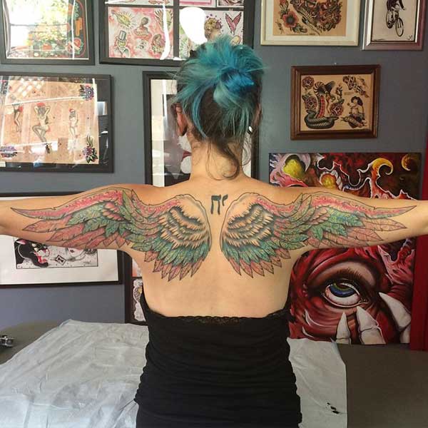 colorful wing tattoo