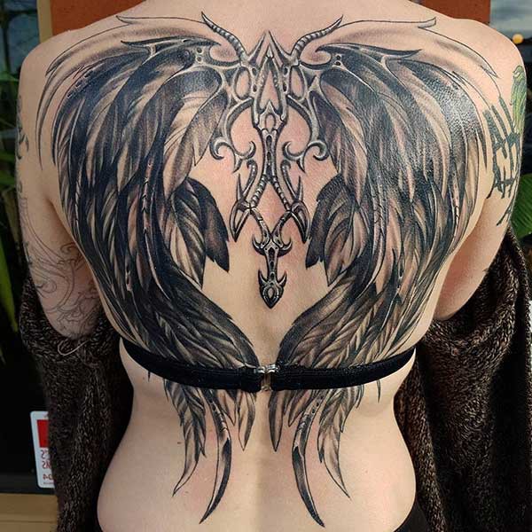 evil angel wing tattoo